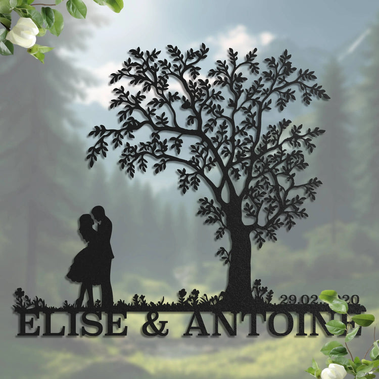 Couple devant un arbre
