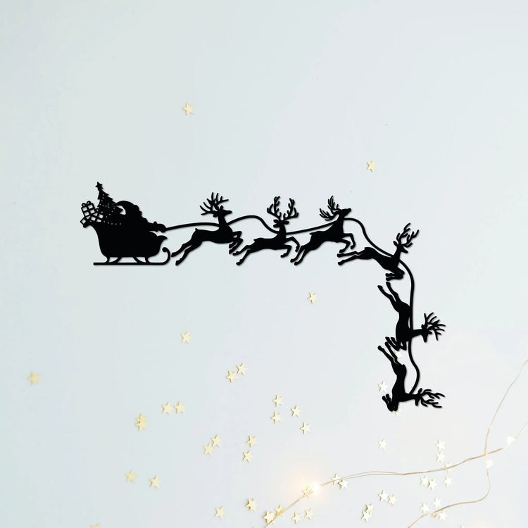 Père Noël volant avec rennes