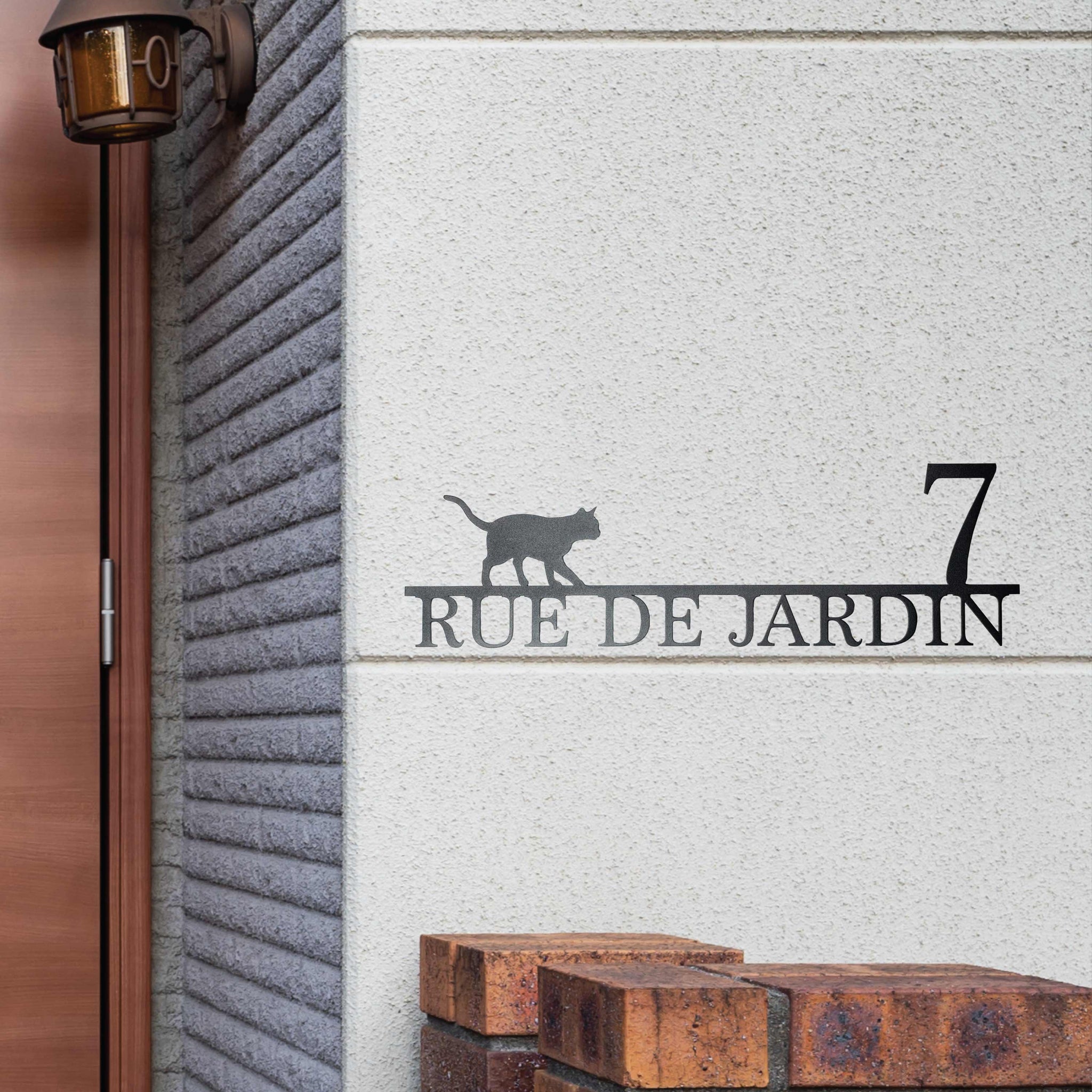 Plaque de rue avec chat