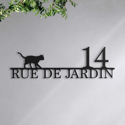 Plaque de rue avec chat